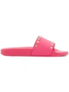Valentino Garavani Rockstud Rubber Slides In Bright Pink