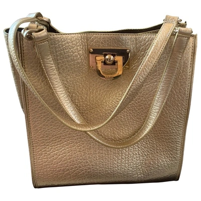 Pre-owned Dkny Leather Handbag In Gold