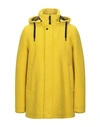 Herno Coats In Yellow