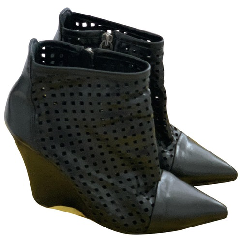 sandro biker boots with gold eyelets