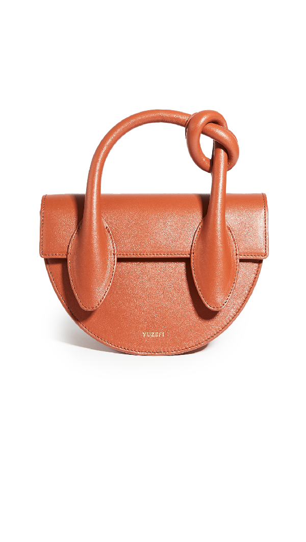 tan saddle bag
