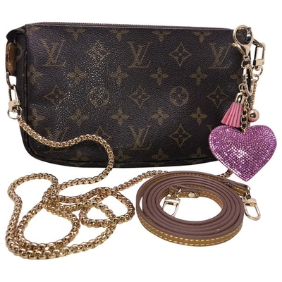 Pre-owned Louis Vuitton Brown Cloth Clutch Bags