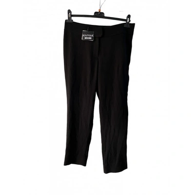Pre-owned Moschino Straight Pants In Black