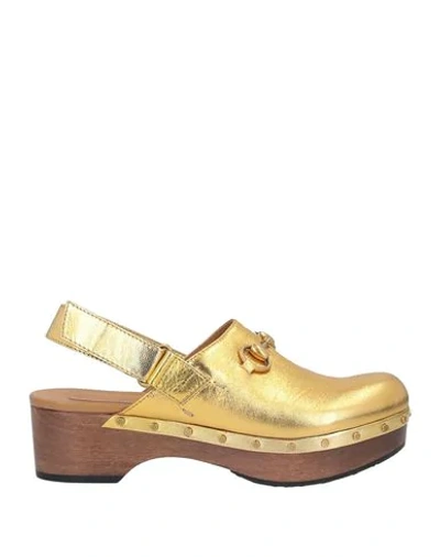 Gucci Mules And Clogs In Gold