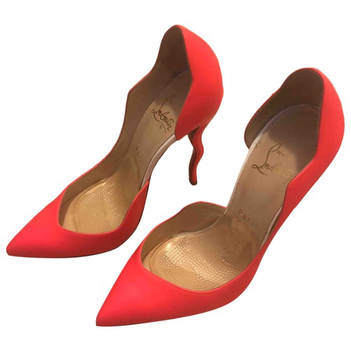 orange christian louboutin heels