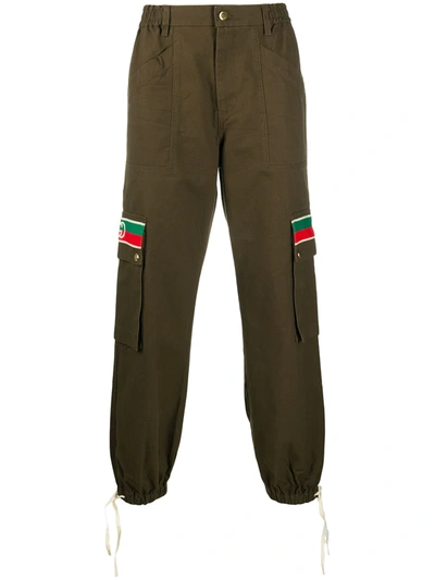 Gucci Tapered Webbing-trimmed Cotton-twill Trousers In Brown