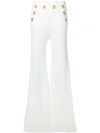 Balmain Button-embellished Stretch-knit Flared Pants In White