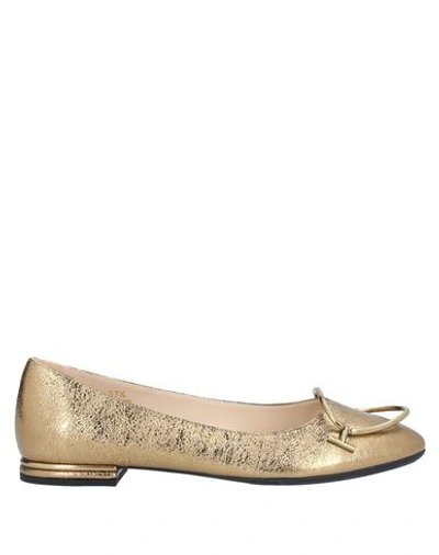 Tod's Ballet Flats In Gold