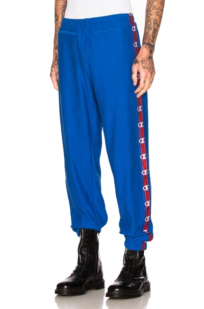 X Champion Tape Track Pants In Blue | ModeSens
