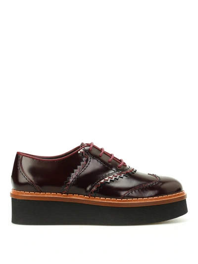 Tod's Leather Wedge Oxford Shoes In Dark Red