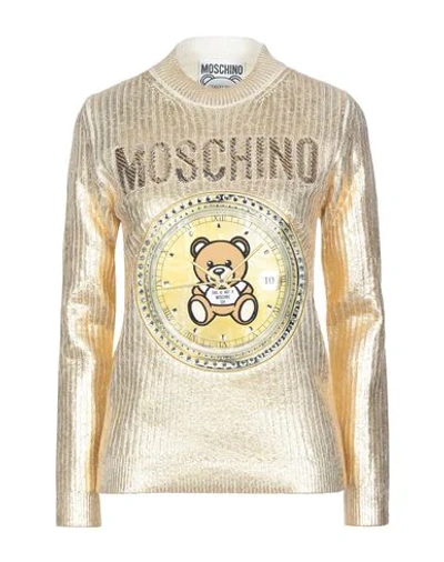 Moschino Sweaters In Gold