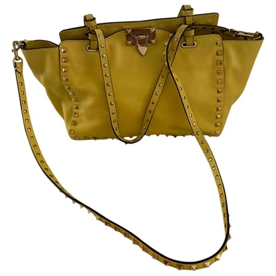 Pre-owned Valentino Garavani Rockstud Leather Handbag In Yellow