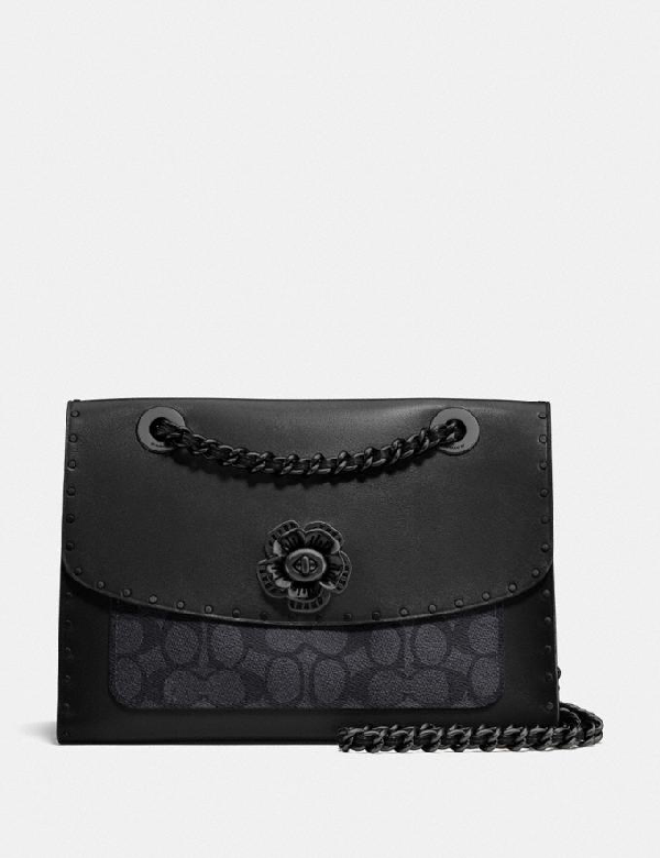coach parker with rivets and snakeskin detail