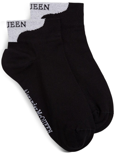 Alexander Mcqueen Logo Heel Tab Ankle Socks In Nero