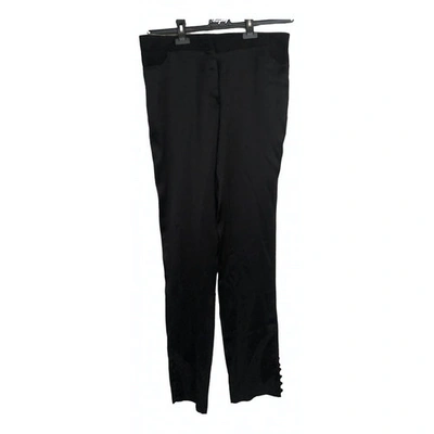 Pre-owned Premiata Silk Trousers In Black