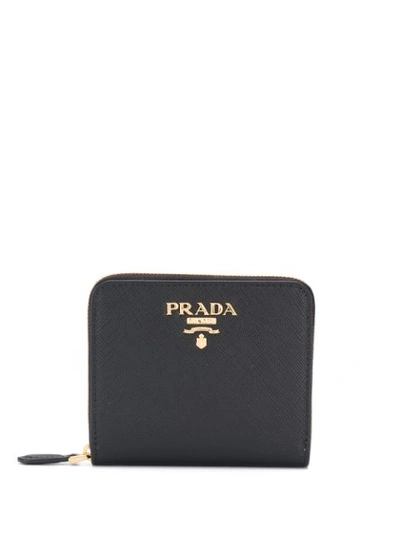 Prada Logo Plaque Zipped Wallet In Black