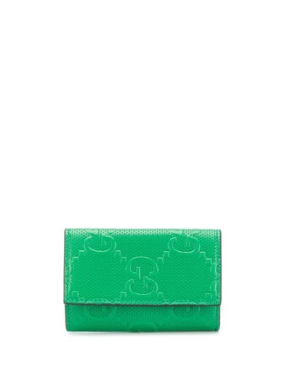 Gucci Gg Embossed Folding Keycase In Green