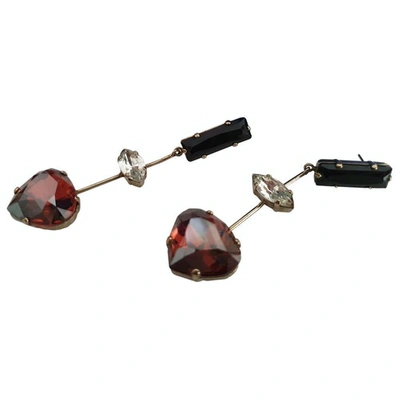 Pre-owned Swarovski Earrings In Red