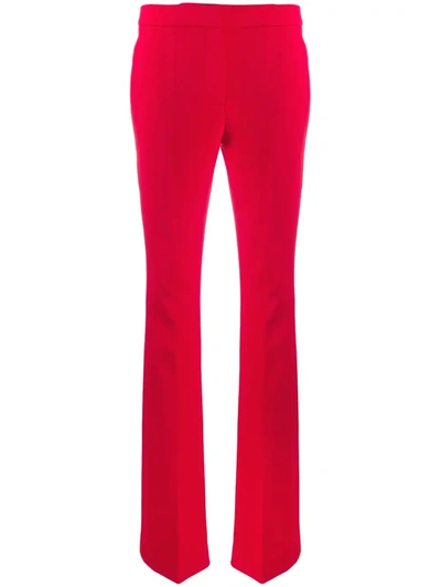 Moschino Flared High-waisted Trousers In Red