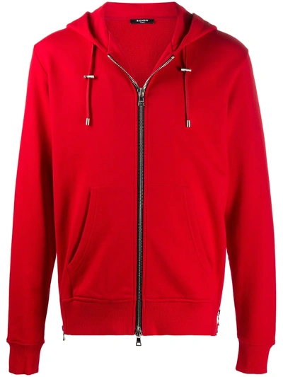 Balmain Embossed Logo-panel Zipped Hoodie In Rouge