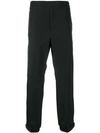 Prada Elasticated Waist Strap Trousers In Black