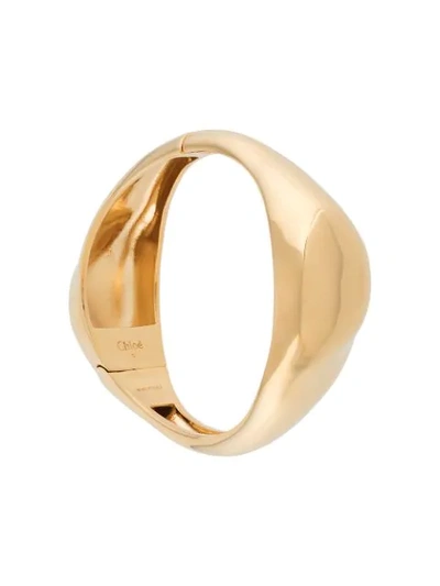 Chloé Polished Asymmetric Cuff Bracelet In Gold