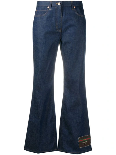 Gucci Flared Jeans With Logo Patch At Leg In Blue