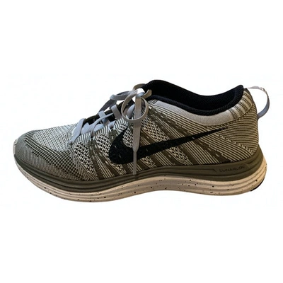 Pre-owned Nike Flyknit Racer Cloth Trainers In Khaki