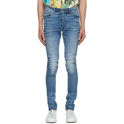 Amiri Stack Distressed Skinny-leg Jeans In Blue