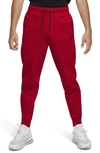 Nike Sportswear Slim Fit Tech Fleece Jogger Pants In Red