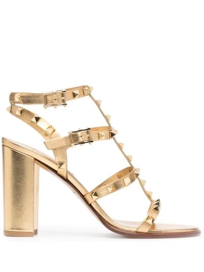 Valentino Garavani Rockstud City Metallic Gladiator Sandals In Gold