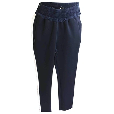 Pre-owned Sandro Trousers In Blue