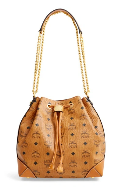 Mcm Berlin Visetos Coated Canvas Drawstring Handbag In Cognac