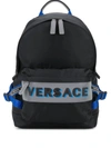 Versace Logo Embossed Backpack In Black