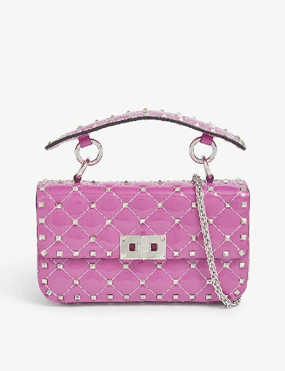 Valentino Garavani Rockstud Spike Small Quilted Patent Leather Cross-body Bag In Bright Pink