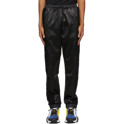 Fendi Logo-embroidered Panelled-shell Track Pants In Black