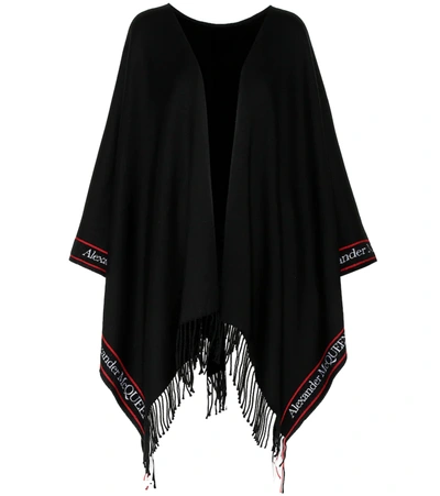 Alexander Mcqueen Fringed Jacquard-trimmed Wool And Cashmere-blend Poncho In Black