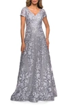 La Femme Embroidered Lace V-neck Cap-sleeve A-line Gown In Platinum
