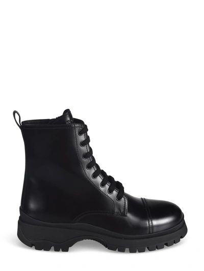 Prada Brushed Leather Ankle Boots In Black