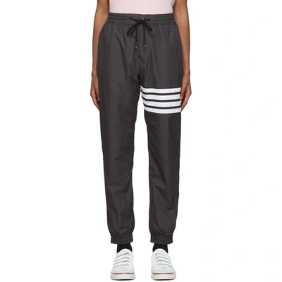 Thom Browne Striped Flyweight Tech Track Pants In Black