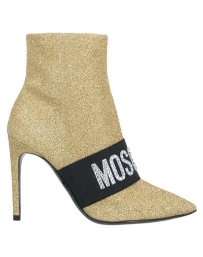 Moschino Ankle Boots In Gold