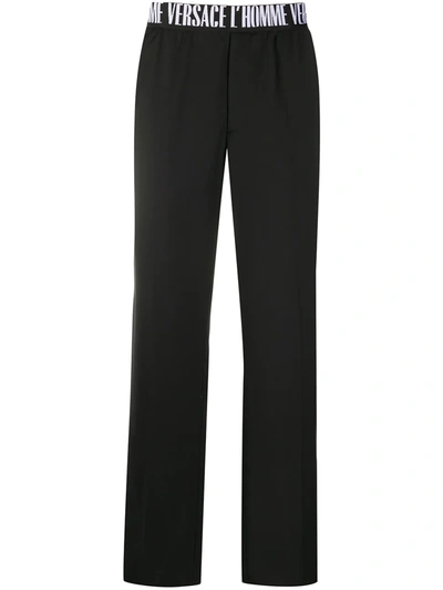 Versace Logo Waistband Straight-leg Trousers In Black