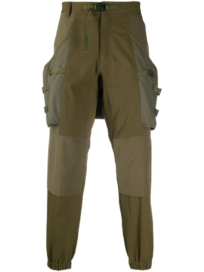 White Mountaineering Panelled Tapered Trousers In Green