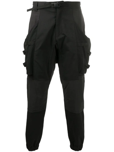 White Mountaineering Panelled Tapered Trousers In Black