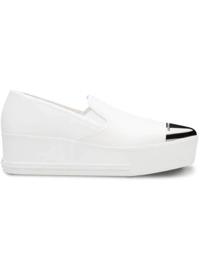 Miu Miu Cap-toe Metallic Platform Slip-on Trainers In Bianco