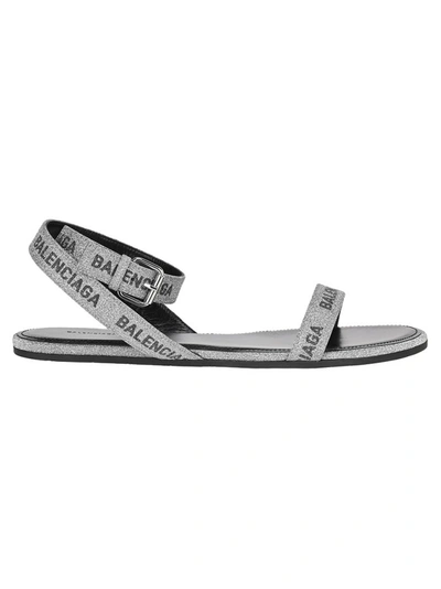 Balenciaga Round Flat Leather Logo Ankle-wrap Sandals In Silver