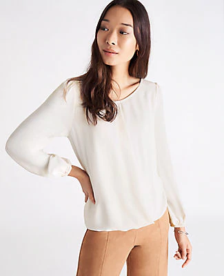 white bubble hem tops