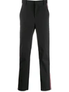 Neil Barrett Side Stripe Chino Trousers In Black