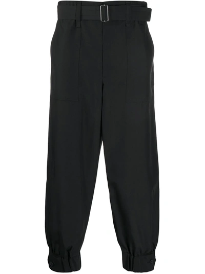 Issey Miyake Buttoned-ankle Tapered Trousers In Black