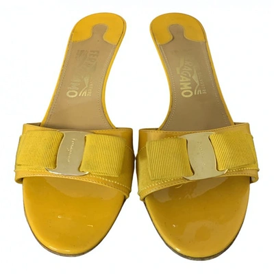 Pre-owned Ferragamo Patent Leather Mules In Yellow